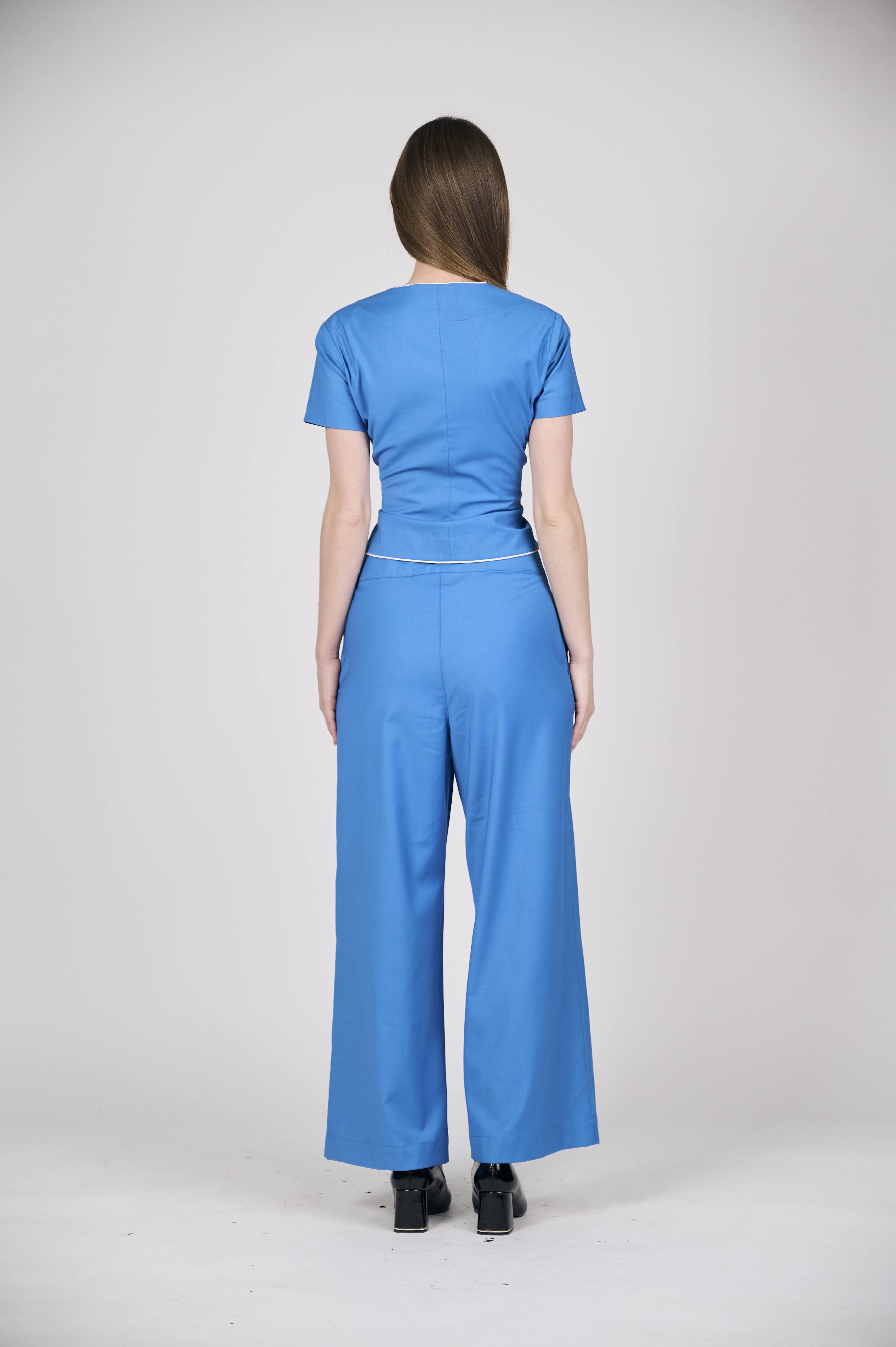 Elegant Blue Peplum Bow Top with White Piping