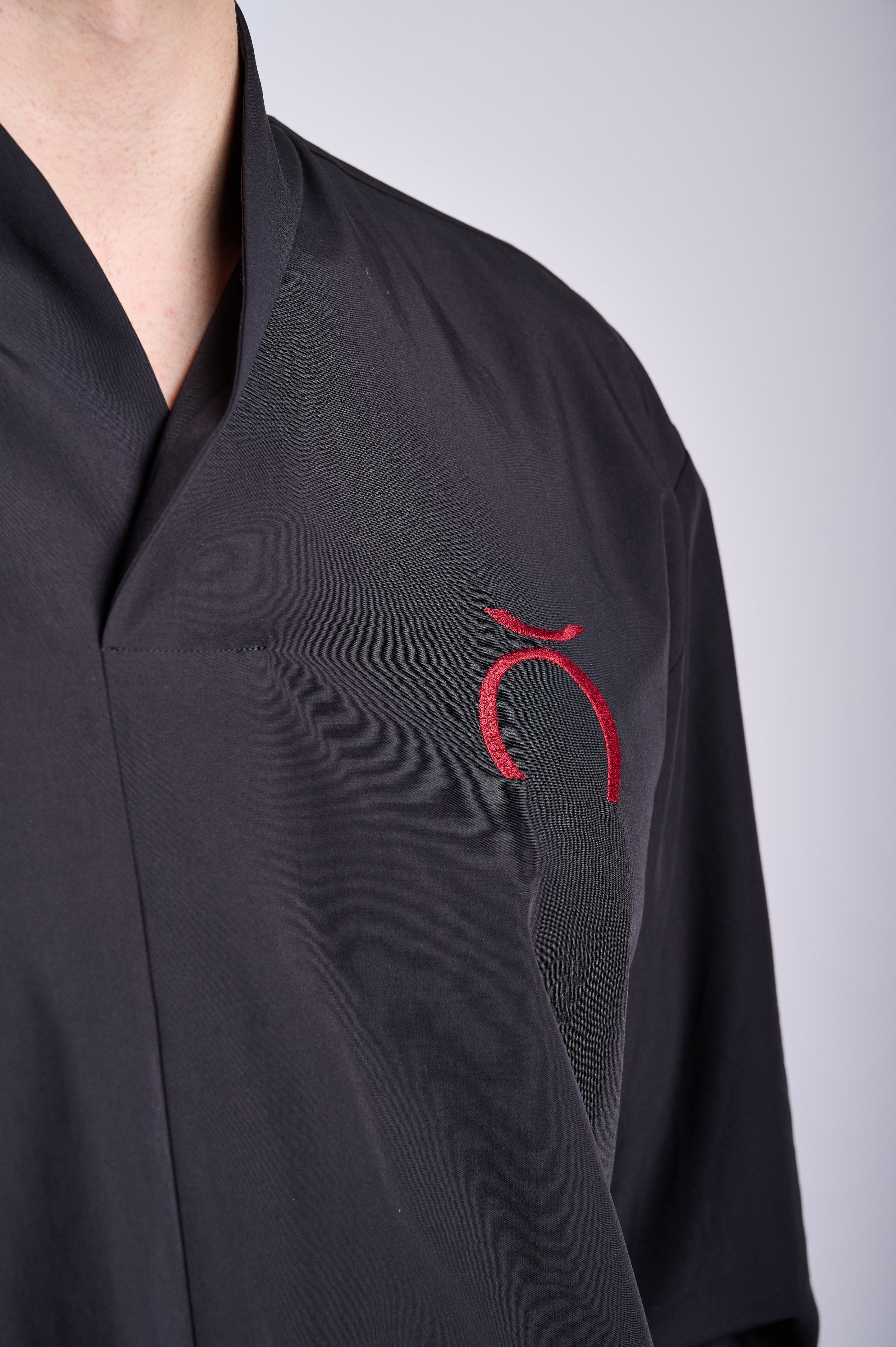 Modern Black Shirt with Minimalist Embroidery