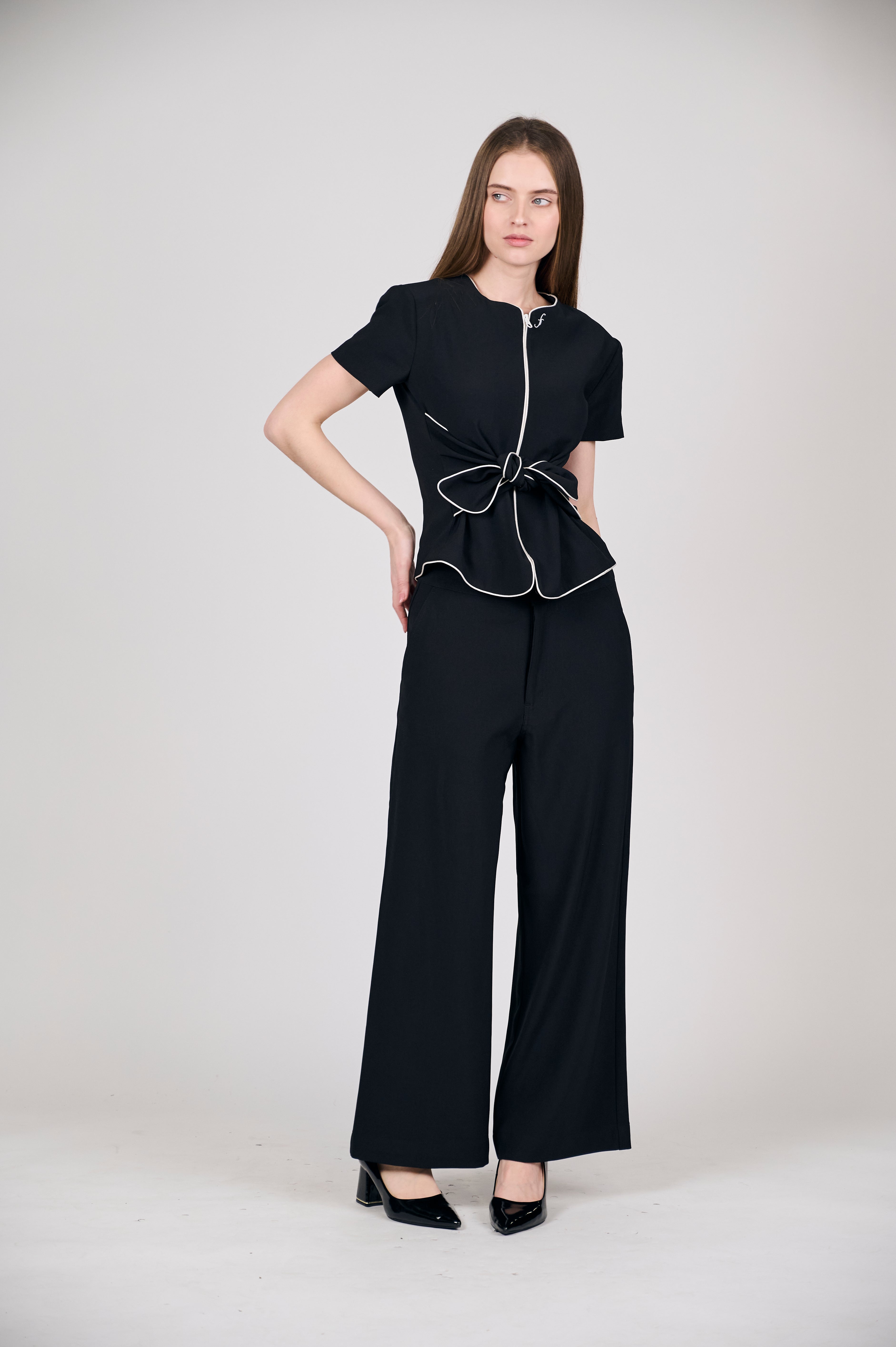 Sophisticated Black Peplum Bow Top with White Piping
